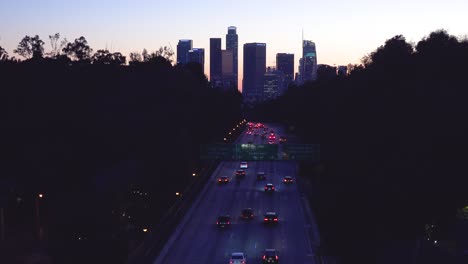 Traffic-Travels-On-The-Pasadena-Freeway-Into-Downtown-Los-Angeles-At-Night-Or-Dusk