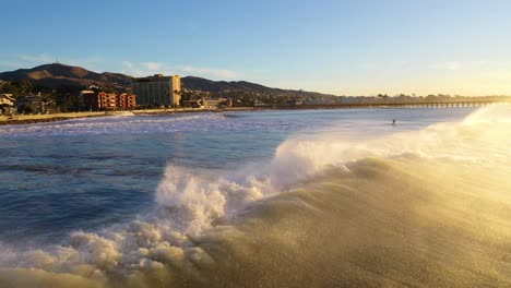 Aerial-Of-Large-Ocean-Waves-Surf-Breaking-Off-The-Coast-Of-Ventura,-California