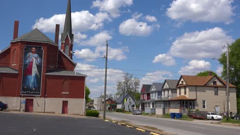 A-Large-Church-With-A-Tall-Mural-Of-Jesus-Establishes-Christianity-As-The-Religion-Of-A-Neighborhood-Near-Moline,-Illinois