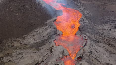 Aerial-Of-Hot-Molten-Lava-Flowing-In-A-River-From-Fagradalsfjall-Volcano-On-The-Reykjanes-Peninsula-In-Iceland