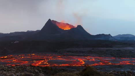 Ground-Level-Shot-Of-Iceland-Fagradalsfjall-Volcano-Eruption-With-Molten-Lava-Fields-In-Motion-Foreground