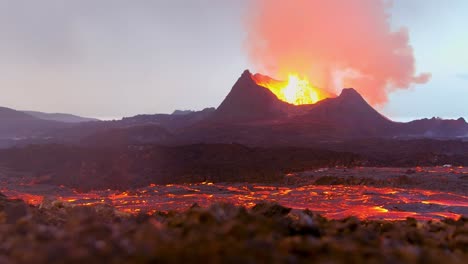 Amazing-Ground-Level-Shot-Of-Iceland-Fagradalsfjall-Volcano-Eruption-With-Molten-Lava-Fields-In-Motion-Foreground