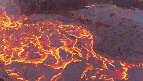 Top-Down-High-Angle-Drone-Aerial-Of-Molten-Lava-Fields-With-Abstract-Patterns-At-The-Fagradalsfjall-Volcano-Eruption-In-Iceland