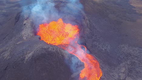 High-Drone-Birds-Eye-View-Aerial-Of-The-Fagradalsfjall-Volcano-Volcanic-Explosive-Eruption-Lava-Begins-To-Flow-On-The-Reykjanes-Peninsula-In-Iceland
