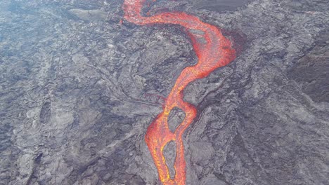 Beautiful-Abstract-Aerial-Shot-Of-Lava-Rivers-Flowing-Near-The-Fagradalsfjall-Volcano-Volcanic-Explosive-Eruption-In-Iceland
