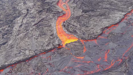 Beautiful-Abstract-Aerial-Shot-Of-Lava-Rivers-Flowing-Near-The-Fagradalsfjall-Volcano-Volcanic-Explosive-Eruption-In-Iceland