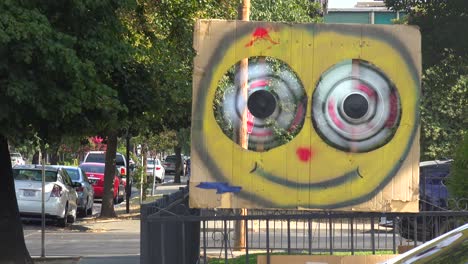A-Funny-Art-Piece-With-Spinning-Eyes-Is-Found-Along-A-Street-In-A-Downtown-Area