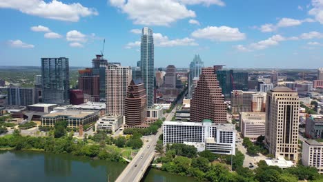 Beautiful-Aerial-Over-Downtown-Austin,-Texas-Reveals-The-State-Capitol-Building-In-The-Distance