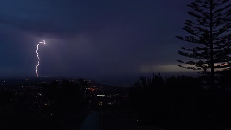 Lightning-Strikes-At-Night-Over-The-City-Of-Ventura,-California-During-A-Large-Electrical-Storm