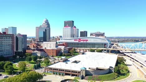 Aerial-Establishing-Shot-Of-The-Downtown-Business-District,-Kfc-Center,-And-Ohio-River-Bridge-In-Louisville,-Kentucky