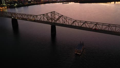 Good-Dusk-Aerial-Establishing-Shot-Of-Louisville,-Kentucky-Downtown-Skyline,-With-George-Rogers-Clark-Memorial-Bridge-In-Foreground