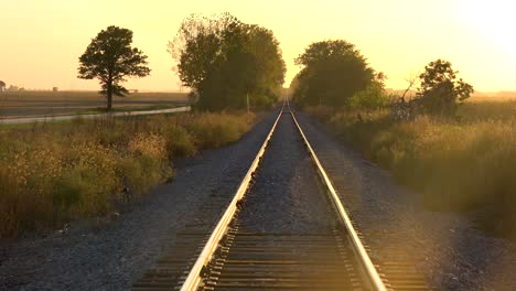 Empty-Railroad-Tracks-Stretch-Into-The-Distance