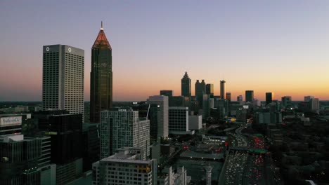High-Establishing-Aerial-Shot-Of-Atlanta,-Georgia-Downtown-Skyline-At-Dusk,-Sunset-Or-Night