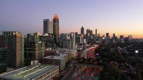 High-Establishing-Aerial-Shot-Of-Atlanta,-Georgia-Downtown-Skyline-At-Dusk,-Sunset-Or-Night