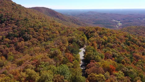 Aerial-Of-Mountain-Road-And-Trees-Turning-Color-In-Autumn-Or-Fall-In-The-Blue-Ridge-Mountains-Of-Appalachia,-North-Georgia,-The-Chattahoochee–Oconee-National-Forest