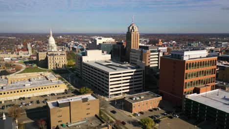 Good-Aerial-Over-Lansing,-Michigan,-The-State-Capitol-Building-And-Downtown-In-The-Distance