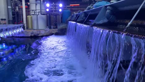 Machinery-Dumps-Water-Into-Tanks-To-Simulate-A-Coral-Reef-At-The-Georgia-Aquarium-In-Atlanta
