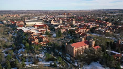 High-Angle-Aerial-Perspective-Establishing-Shot-Of-The-University-Of-Colorado-Boulder-Campus-In-Winter