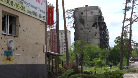 A-Devastated-Neighborhood-Of-Irpin,-Kiev,-Where-A-Real-Estate-Billboard-Advertises-A-Better-Future