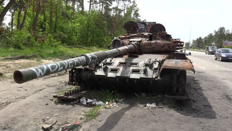 An-Abandoned-And-Destroyed-Russian-Tank-Along-A-Highway-Into-Kyiv-Following-The-Russian-Invasion