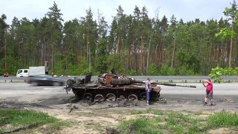 An-Abandoned-And-Destroyed-Russian-Tank-Along-A-Highway-Into-Kyiv-Following-The-Russian-Invasion