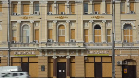 Buildings-Are-Completely-Boarded-Up-And-Abandoned-In-Downtown-Kharkiv,-Ukraine-During-Russian-Invasion,-Shelling-And-Bombing-Attacks