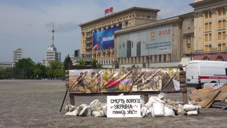 A-Handmade-Sign-In-Kharkiv-Central-Square-And-Administration-District-Reads-""Death-To-The-Enemy,-Ukraine-Above-All""