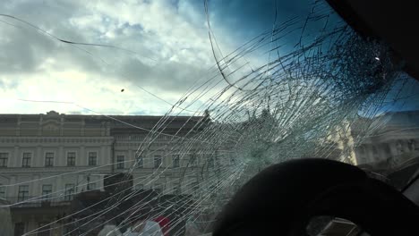 A-Shattered-Windshield-In-A-Vehicle-Struck-By-Russians-During-The-Occupation-Of-Kyiv-Kiev