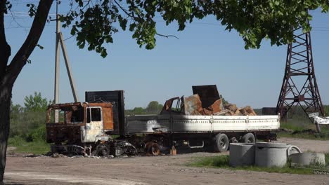 A-Burned-And-Destroyed-Transport-Truck-By-The-Side-Of-The-Road-During-The-War-In-Ukraine