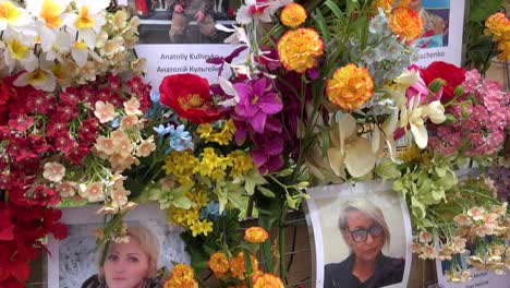 A-Large-Flowered-Memory-Wall-Of-Fallen-Female-Ukrainian-War-Heroes-Killed-By-Russian-Aggression-Along-A-Main-Street-In-Lviv,-Ukraine