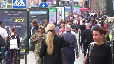 Large-Urban-Crowds-Of-Ukrainians-Walk-On-The-Street-In-Central-Lviv,-Ukraine