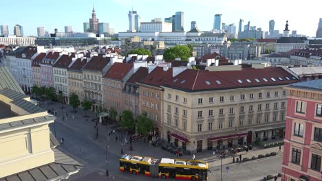 Nice-Establishing-Shot-Of-Downtown-Warsaw-Poland-Framed-By-The-Old-City-Warszawa-In-Foreground-With-City-Bus-Passing