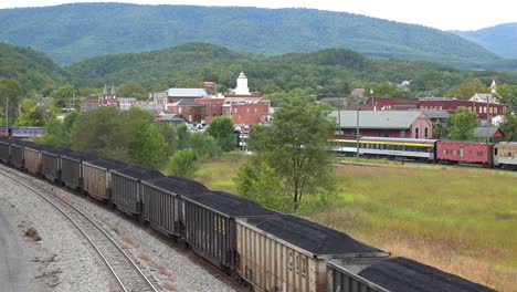 A-Long-Coal-Train-Rumbles-Through-Virginia-And-West-Virginia-Suggesting-American-Coal-Towns