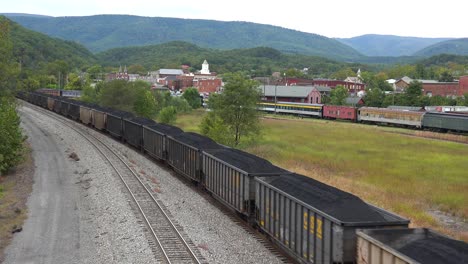 A-Long-Coal-Train-Rumbles-Through-Virginia-And-West-Virginia-Suggesting-American-Coal-Towns