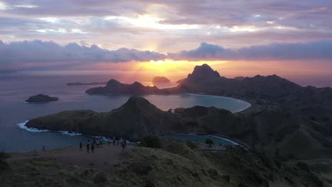 Excellent-Aerial-Shot-Of-Tourists-Enjoying-The-View-Of-Sunset-From-Padar-Island-Within-Komodo-National-Park-In-Indonesia