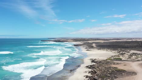 Excellent-Aerial-Shot-Of-Waves-Lapping-Sheringa-Beach-On-Eyre-Peninsula,-South-Australia