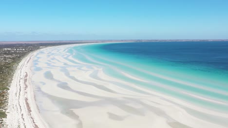 Excellent-Aerial-Shot-Of-Clear-Blue-Water-And-White-Sands-Of-Flaherty-Beach-On-The-Yorke-Peninsula,-Australia