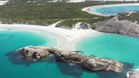 Excellent-Aerial-Shot-Of-Clear-Blue-Surf-Cresting-On-The-White-Beaches-Of-Wylie-Bay,-Esperance,-Australia