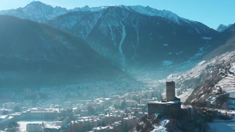 Excellent-Aerial-View-Of-Martigny,-Switzerland,-Nestled-In-The-Mountains