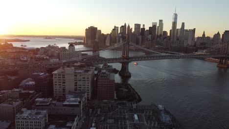 Very-Good-Aerial-Over-Lower-Manhattan-New-York,-Brooklyn-Bridge,-Manhattan-Bridge-And-East-River