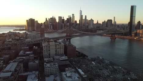 Very-Good-Aerial-Over-Lower-Manhattan-New-York,-Brooklyn-Bridge,-Manhattan-Bridge-And-East-River