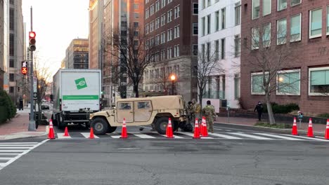National-Guard-Troops-Patrol-The-Capitol-Washington-Dc-Following-The-Trump-Insurrection-And-Riots,-Military-Trucks-Block-The-Streets