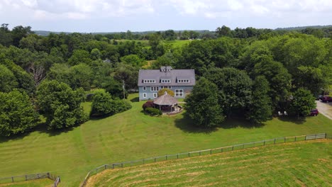 Excellent-Aerial-View-Tracking-Back-From-A-Farmhouse-In-Leesburg,-Virginia