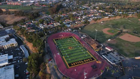 Excellent-Aerial-View-Pulling-Back-From-A-Football-Game-At-Capo-Valley-High-School