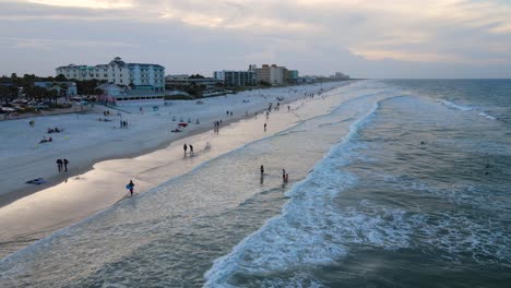 Excellent-Aerial-View-Of-People-On-New-Smyrna-Beach,-Florida-At-Dusk