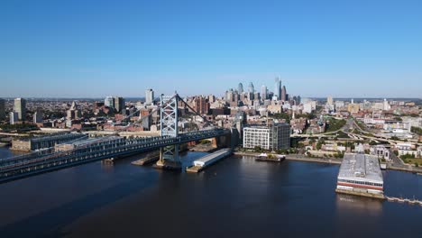 Excellent-Aerial-View-Pulling-Away-From-The-Benjamin-Franklin-Bridge-In-Philadelphia,-Pennsylvania