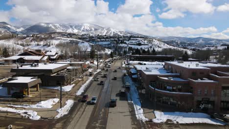 Excellent-Aerial-View-Of-Cars-Approaching-Steamboat-Springs,-Colorado