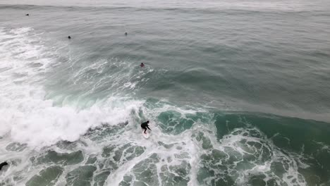 Excellent-Aerial-View-Of-Surfers-On-The-Waves