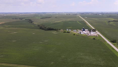Aerial-Drone-Video-Of-Rich,-Green-Rural,-Agrarian-Agricultural-Farmland-Corn-And-Bean-Midwest-Heartland-Of-Iowa