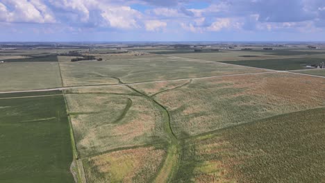 Aerial-Drone-Video-Wind-Damage-To-Rural,-Agrarian-Agricultural-Crops-And-Farmland-In-The-Midwest-Heartland-Of-Iowa